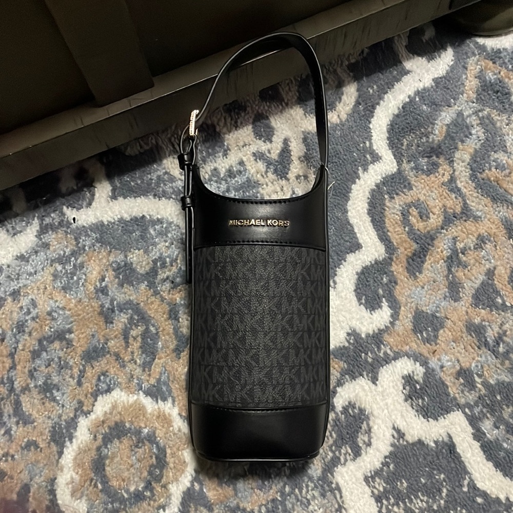 Michael Kors black wine bottle holder.